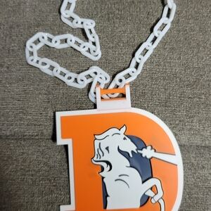 Vibrant Orange and White Chain with Horse Design